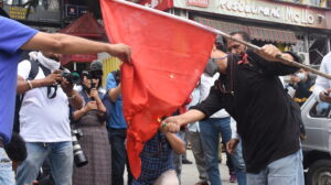 Activists burn the Chinese flag at McLeod Ganj’s main square protesting Chinese incursion in Ladakh and killing Indian soldiers. (June 18, 2020 Phayul photo-Kunsang Gashon).