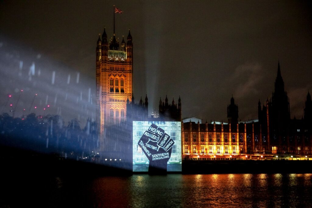 Activists in London protested via night projection onto the British parliament on Thursday (Photo- Free Tibet)