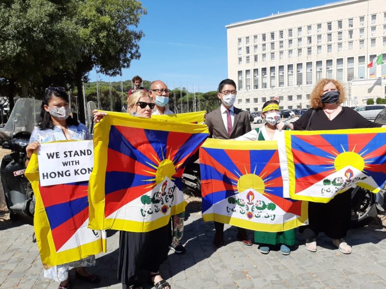 HK activist Nathan Law with supportes of Tibet and Hong Kong during the protest against the visiting Chinese Foriegn Minister Wang Yi on Tuesday (Photo- CTA)