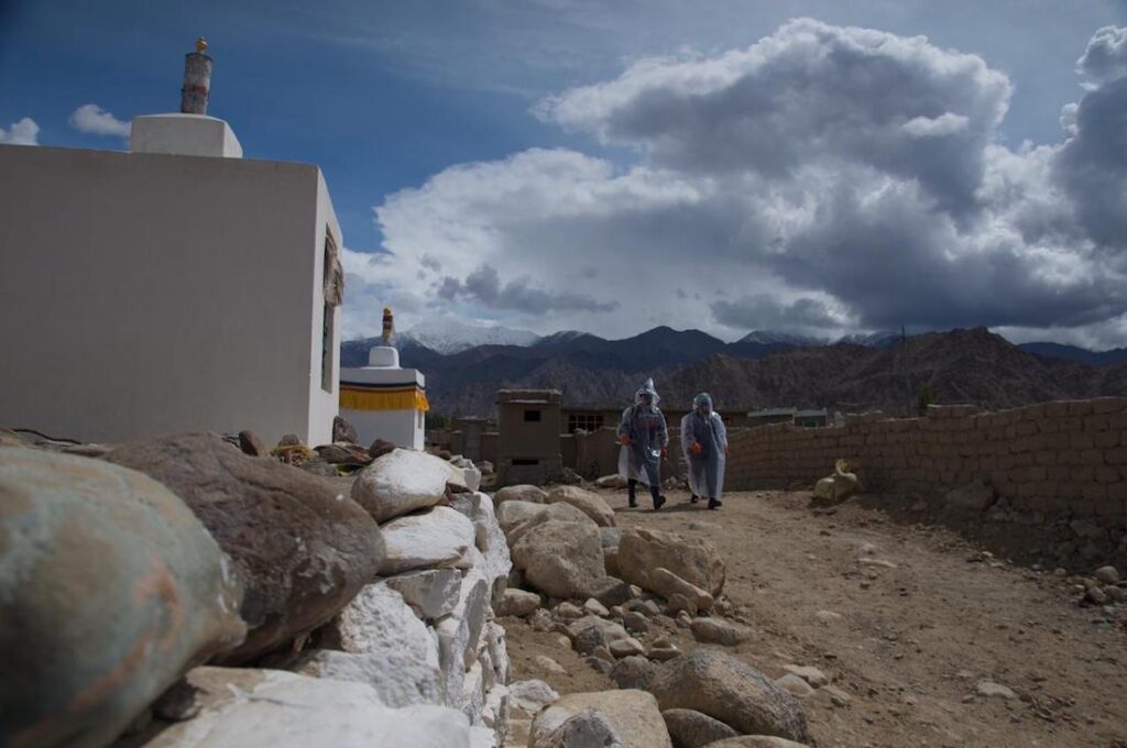 Health care workers during a sanitizing drive at Sonamling Tibetan settlement in UT of Ladakh (Phayul file photo)