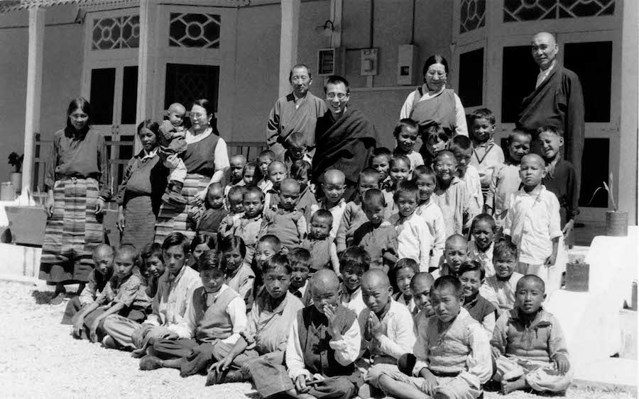 His Holiness the Dalai Lama with children of Tibetan road-builders in Jammu at Swarg Ashram in Dharamshala (OHHDL)