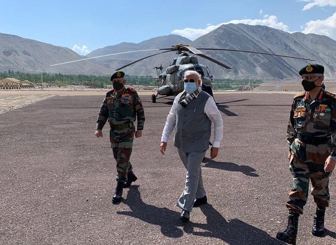 Indian PM Narendra Modi flanked my military top brass at Leh on Friday (PTI)